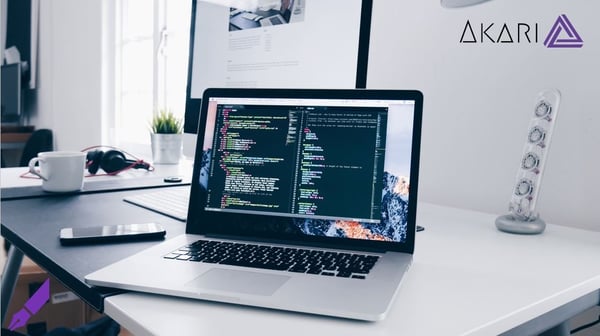 Code text on a laptop illustrating AI