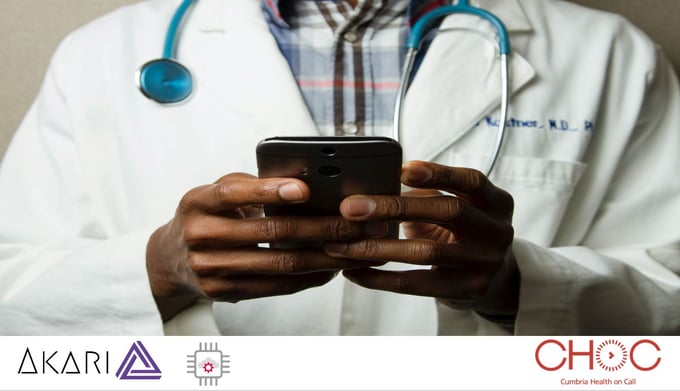 Doctor holding mobile phone